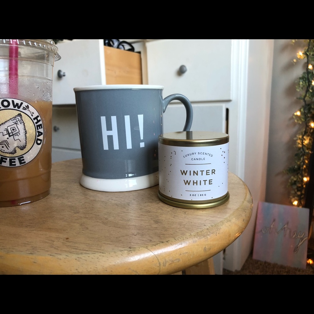a cute “hi!” mug and a winter white candle